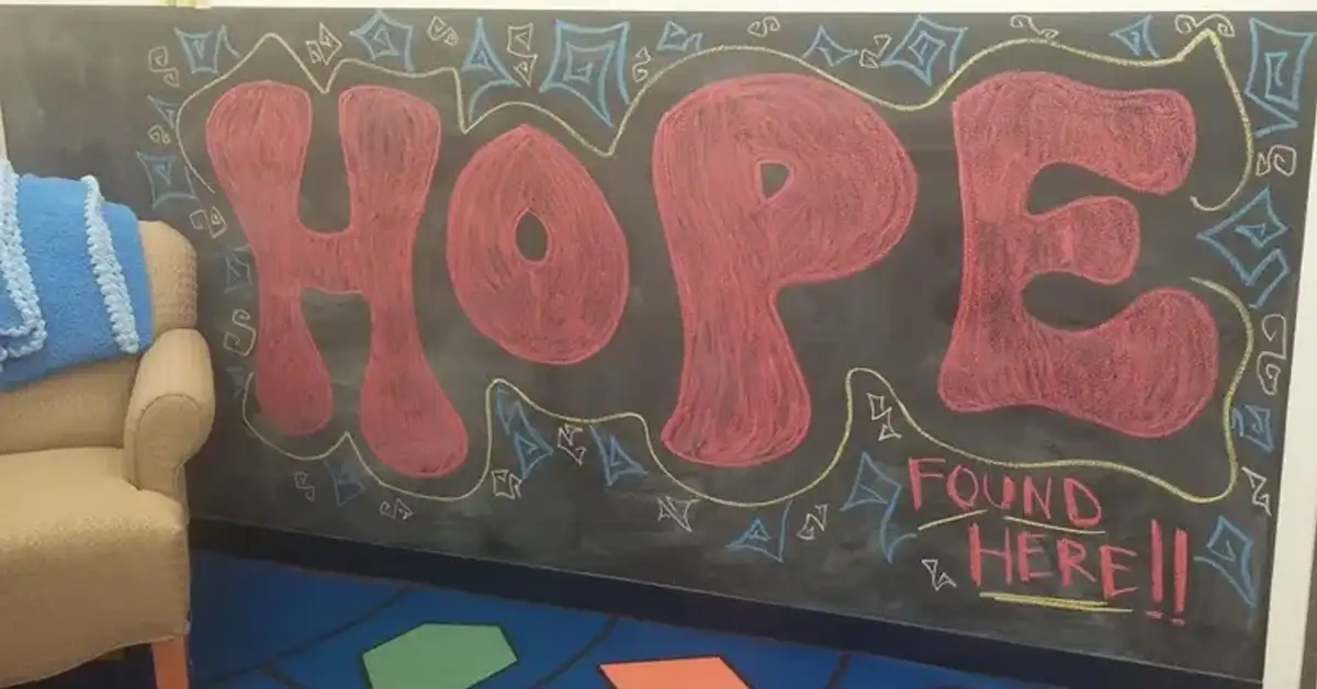 A chalkboard at Jeremiah's Place with "Hope is found here" written on it